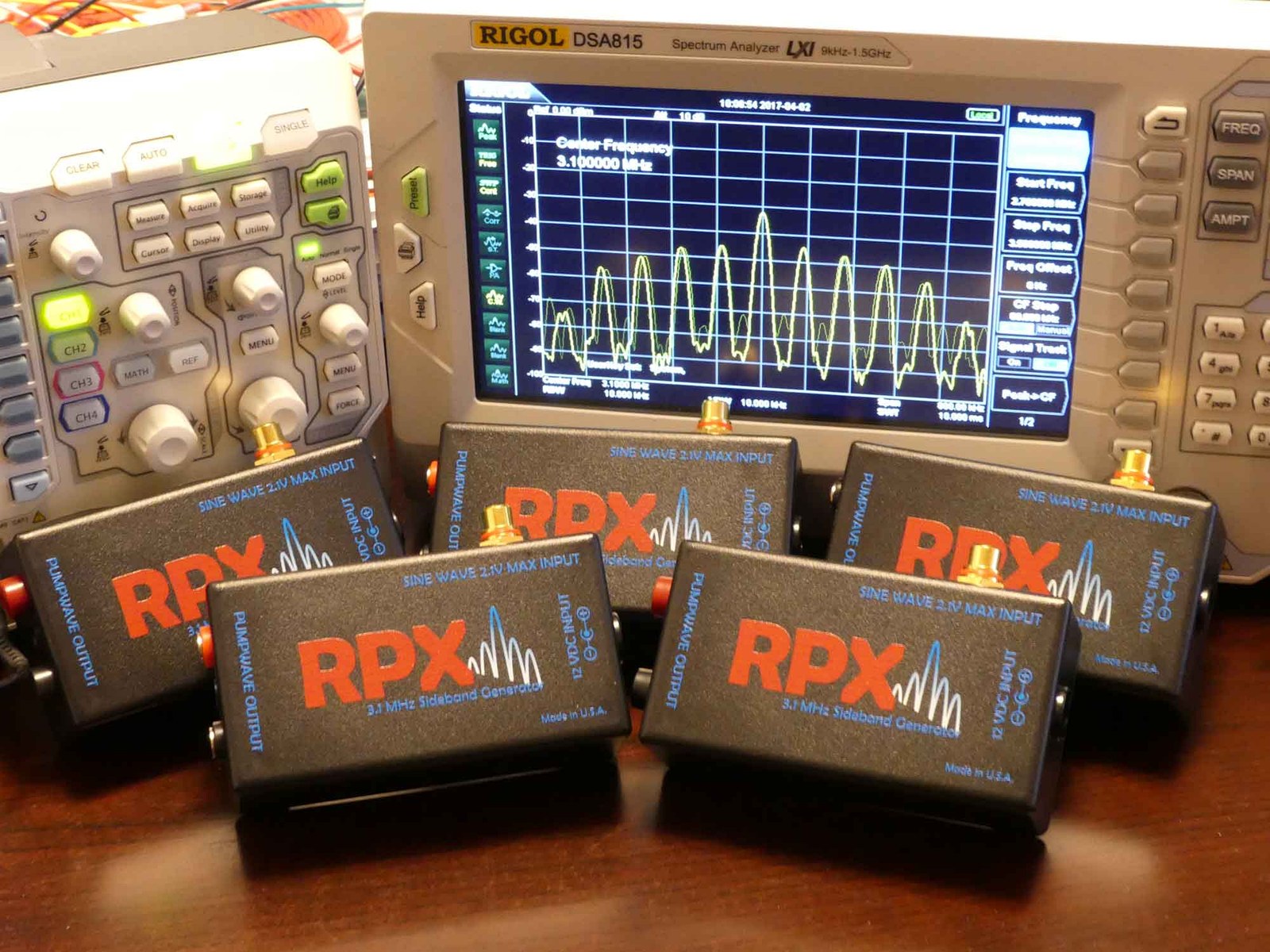 Multiple Bedini RPX sideband generators in front of a spectrum analyzer